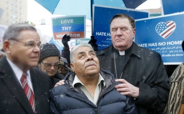 Clergy stand with grandpa fighting deportation
